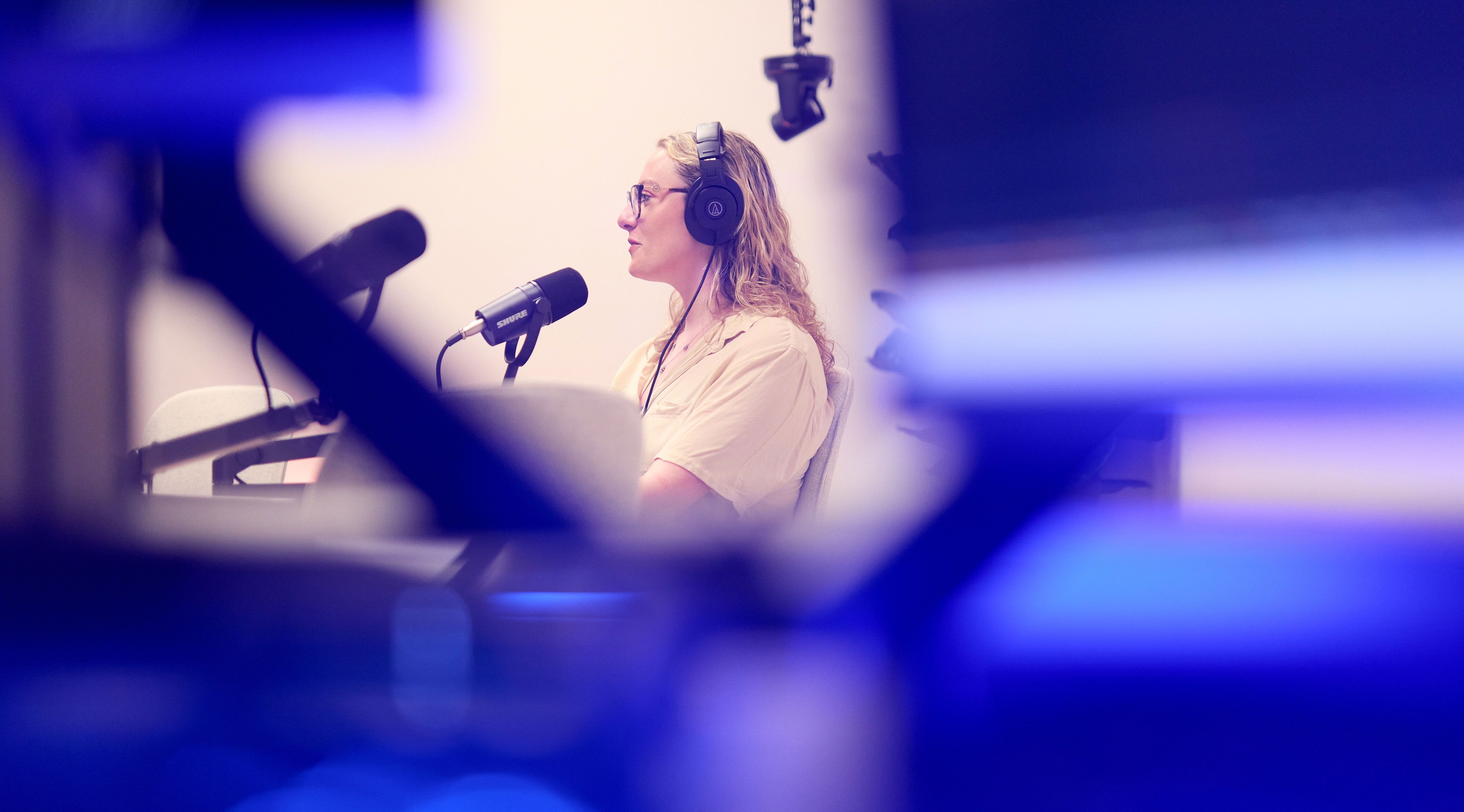 Female podcaster in studio
