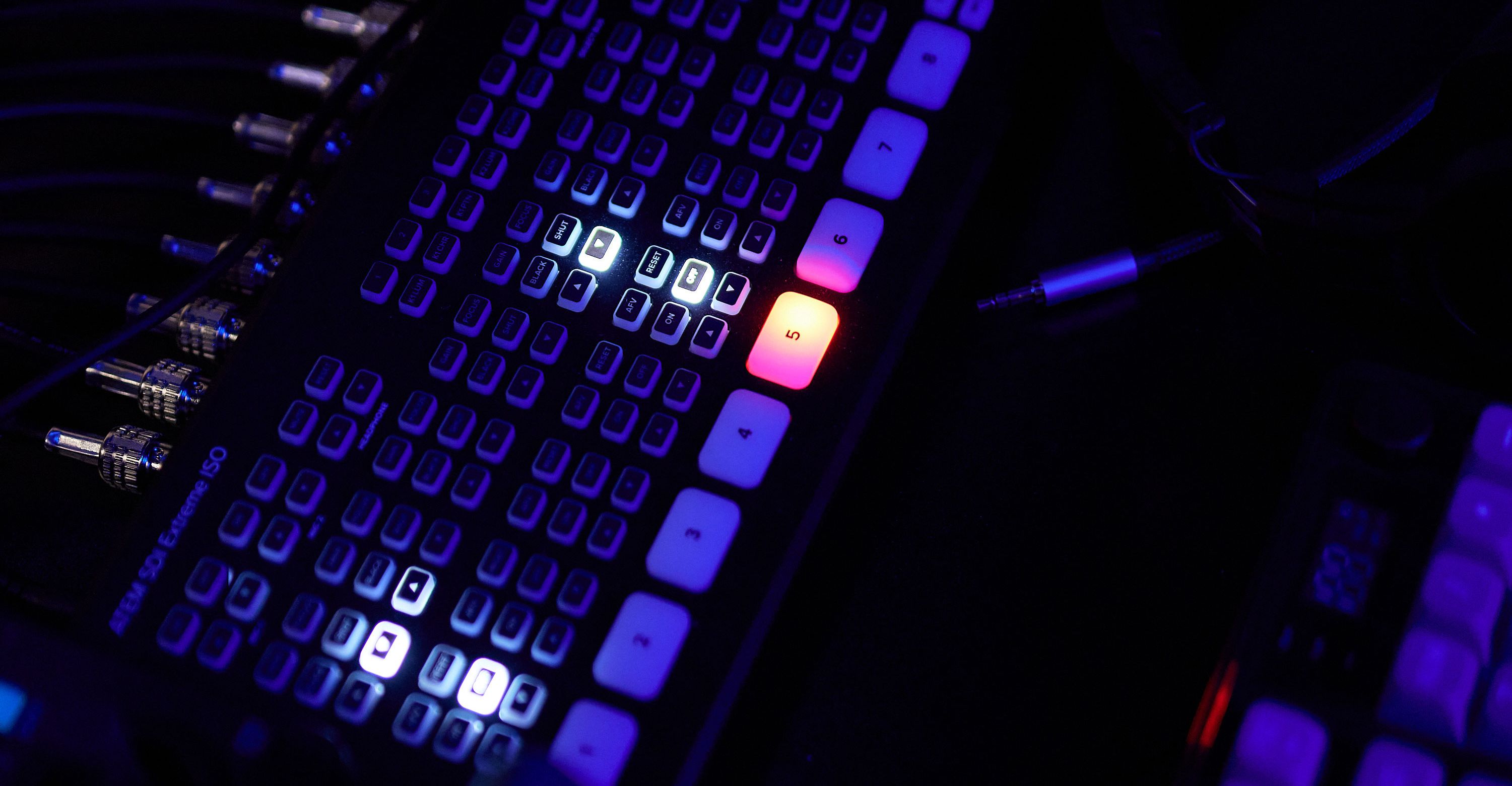 A close up of a sound console